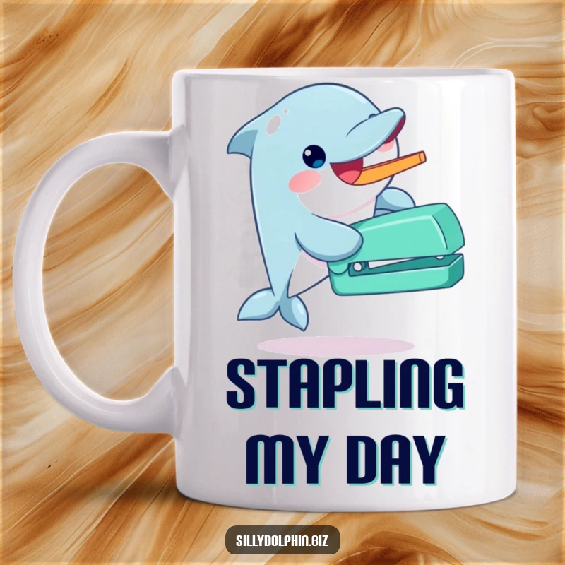Funny dolphin mug gleefully operating an oversized stapler with its fin, conveying enthusiastic productivity.